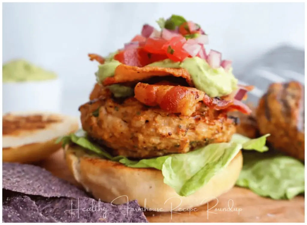 Healthy grilling recipe - chicken burger stacked with bacon and pico.
