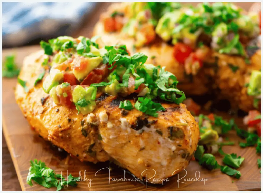 Grilled chicken with avocado and cilantro topping