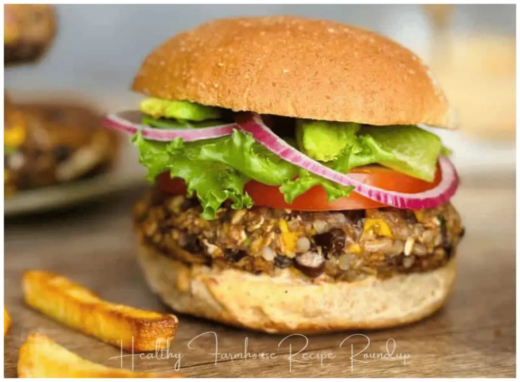 Chipotle black bean burger with toppings and bun, fries on the side