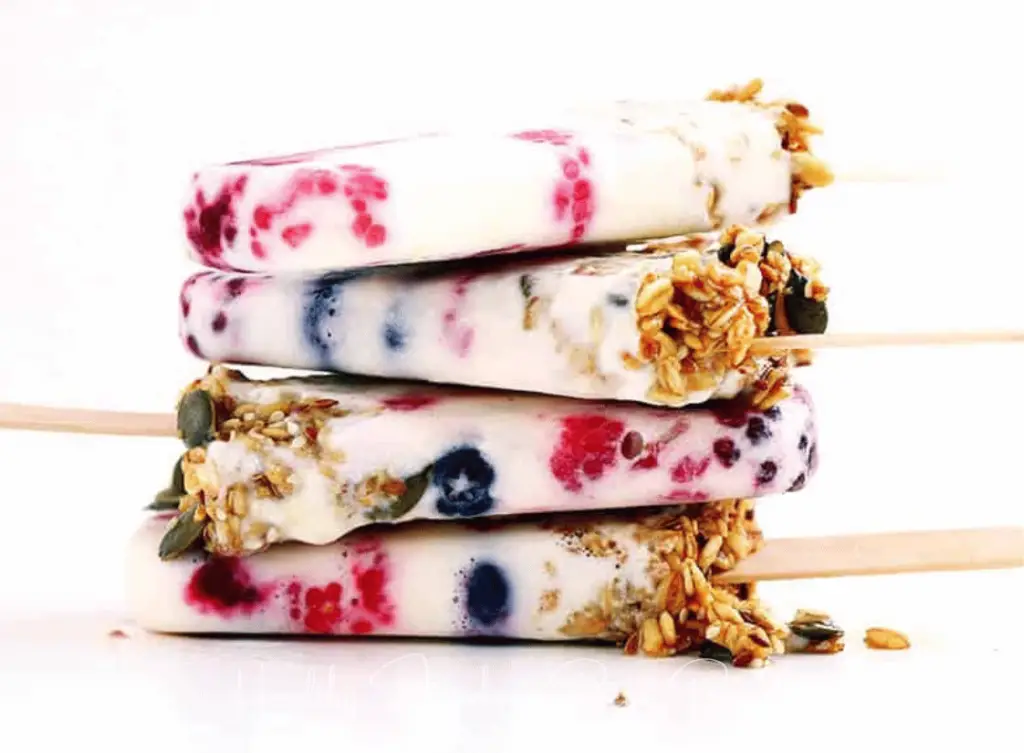 Breakfast fruit popsicle recipe with granola on bottom