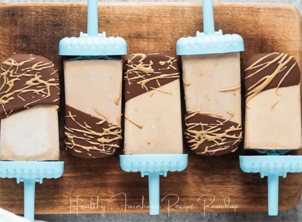 Fudgesicles dipped in chocolate and drizzled with peanut butter.