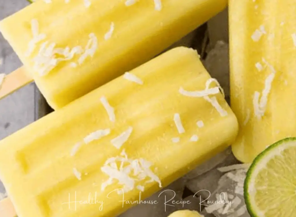 Yellow pineapple fruit popsicle recipe with coconut shavings
