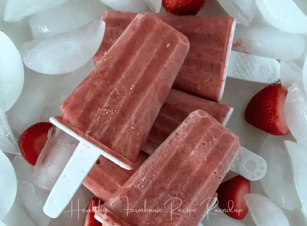 Deep red colored frozen strawberry popsicle recipe