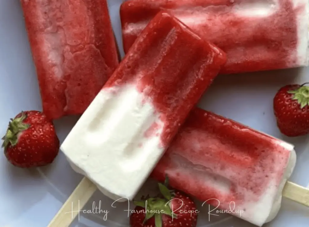 Deep red and white popsicle with strawberries