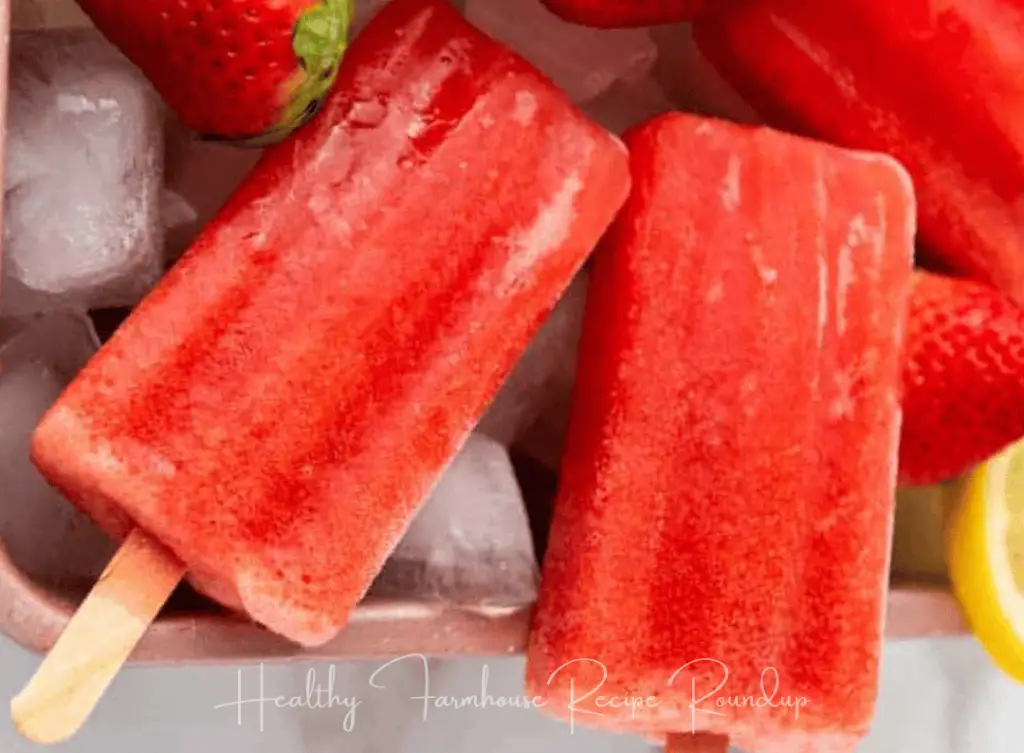 Bright red strawberry popsicles