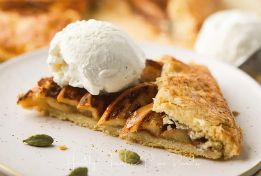 Slice of apple pie dessert on a plate with icecream