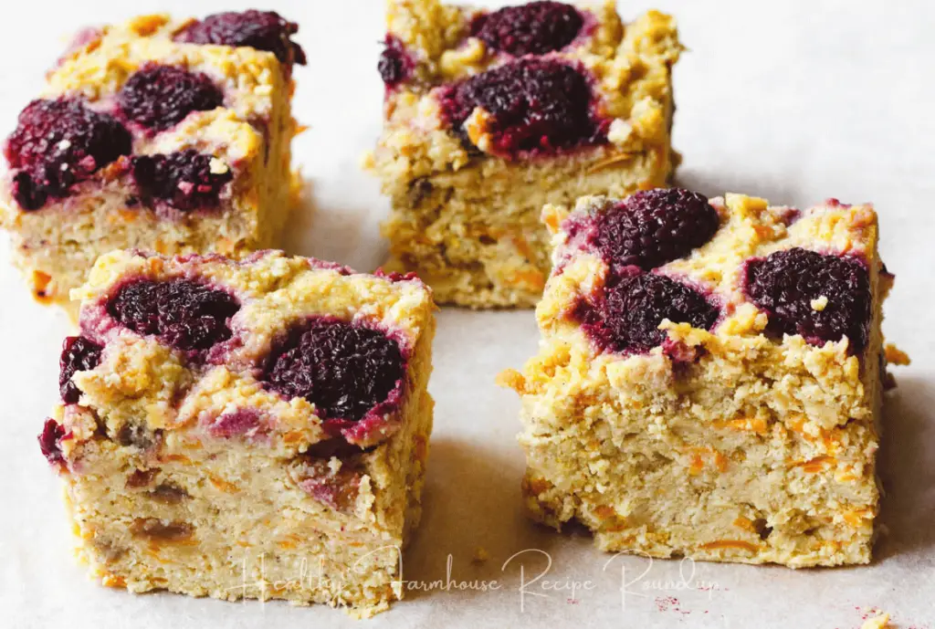 gluten free cake squares with blackberries on top