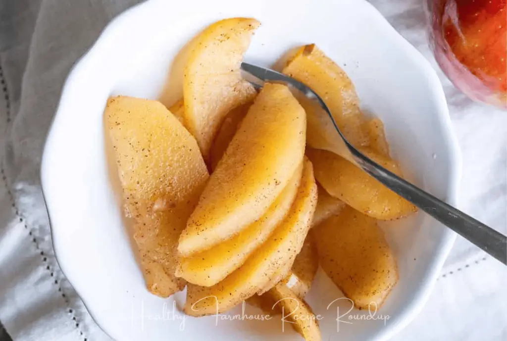 Healthy baked apple slices in bowl