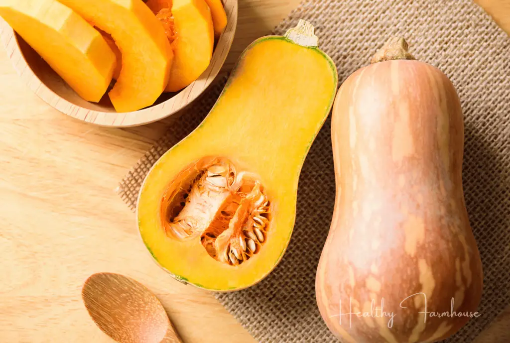 whole butternut squash, half butternut squash, and butternut squash cut into slices