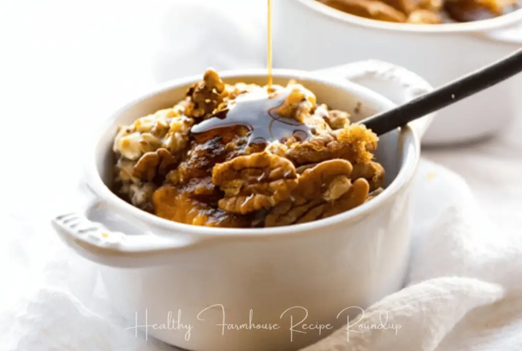 Pumpkin breakfast bowl - cooked oats with nuts and syrup