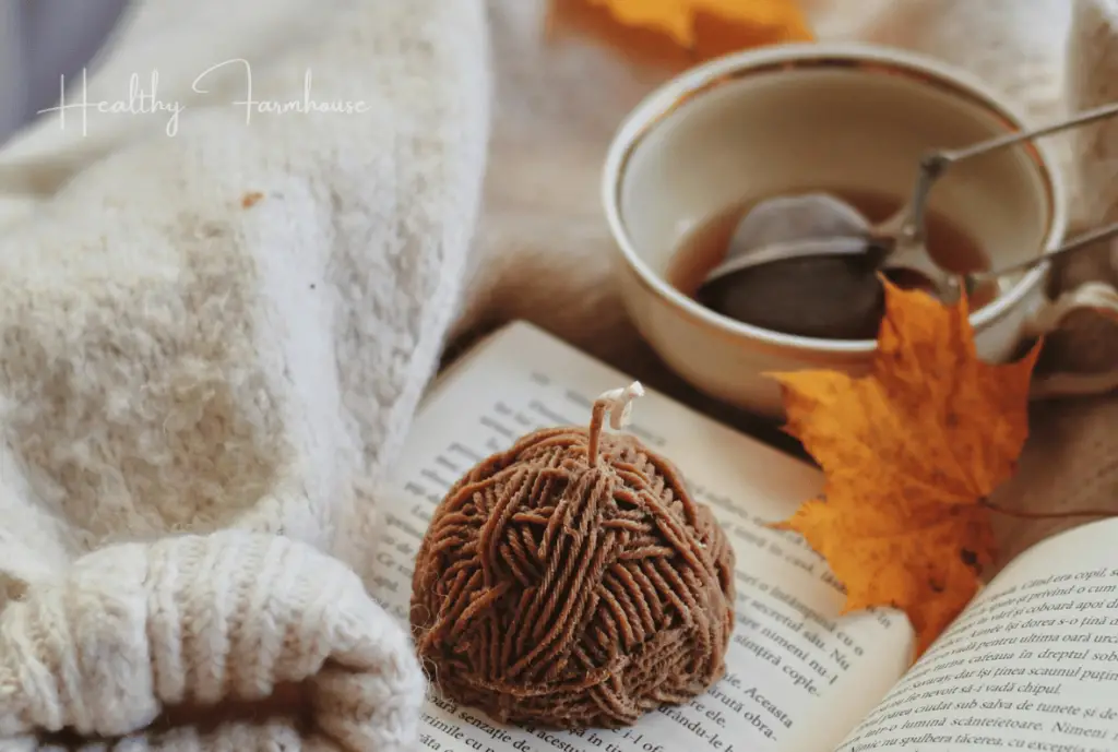 Tea cup and pumpkin candle