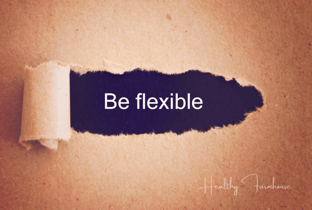 The words BE FLEXIBLE on paper