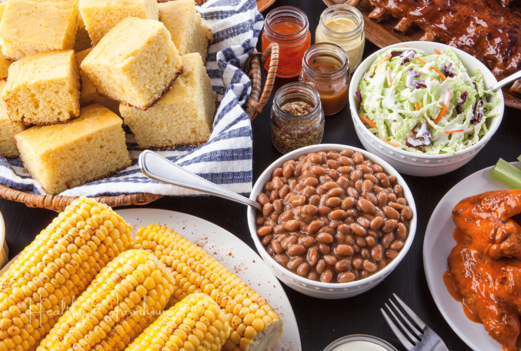 Summer sides: cornbread, corn on the cob, baked beans, coleslaw